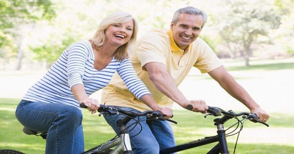 blog picture of elderly couple riding bicycles