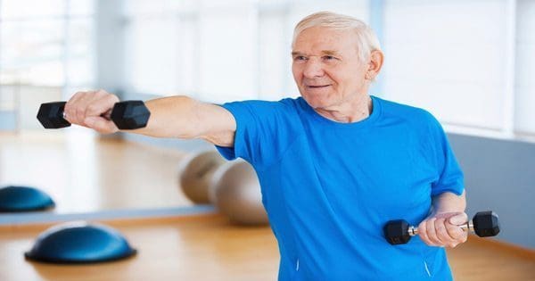 blog picture of elderly man working out with light weights