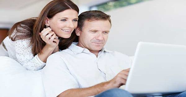blog picture of couple researching on laptop