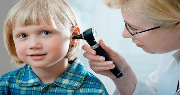 blog picture of doctor giving ear exam on child