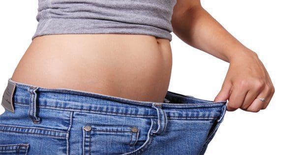 blog picture of woman's jeans are too large for her now