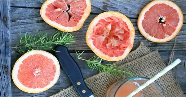 blog picture of grapefruit and rosemary on table
