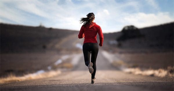 blog picture of lady running in the middle of the road