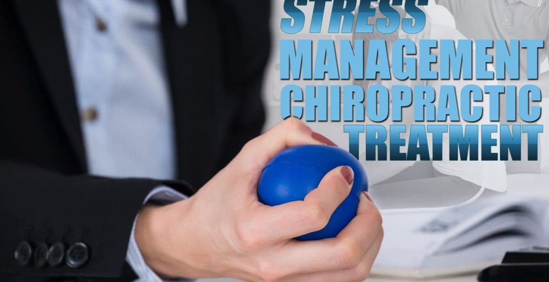 Image of a person holding a stress ball as part of a stress management chiropractic treatment.